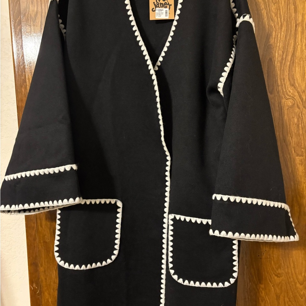Black Wrap Coat from Ivy Jane with White Whip Stitch Trim